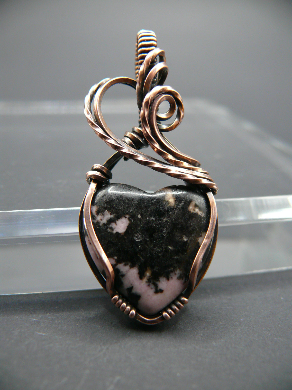 Rhodochrosite gemstone heart pendant in solid copper