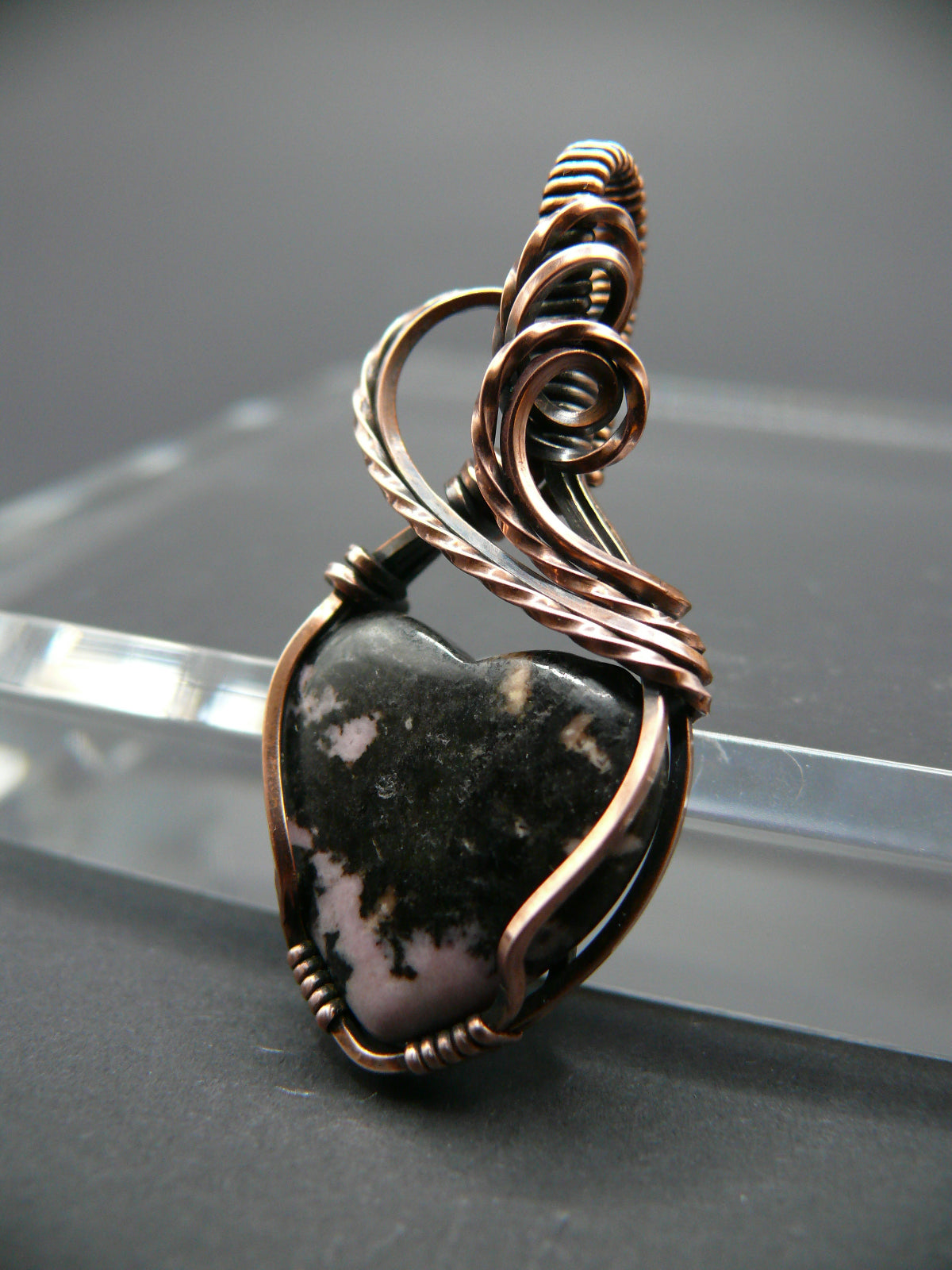 Rhodochrosite gemstone heart pendant in solid copper