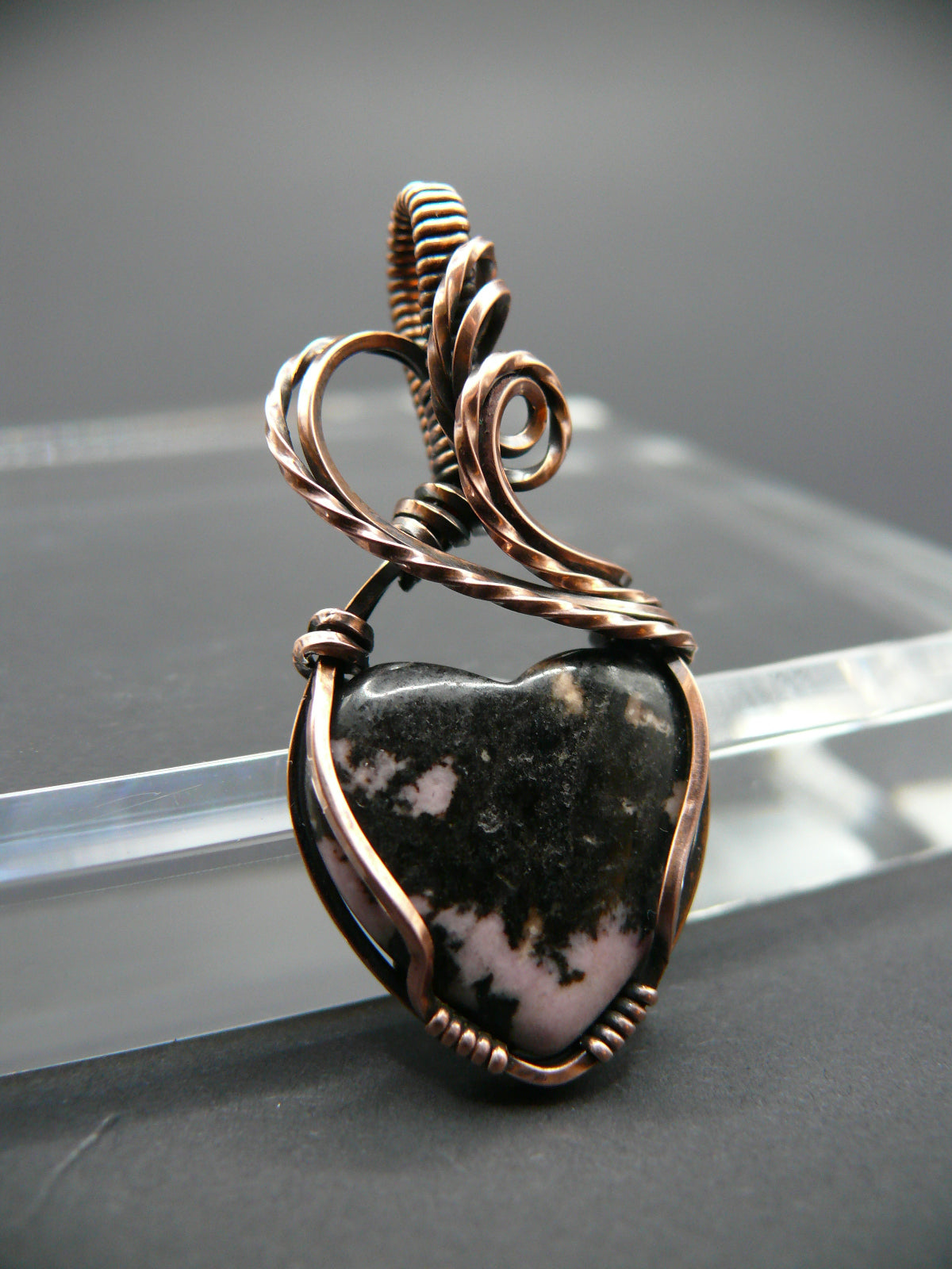 Rhodochrosite gemstone heart pendant in solid copper