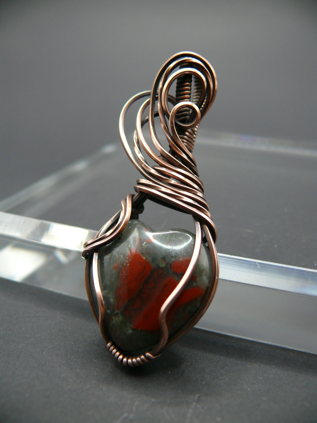 Heart shaped wire wrapped bloodstone pendant