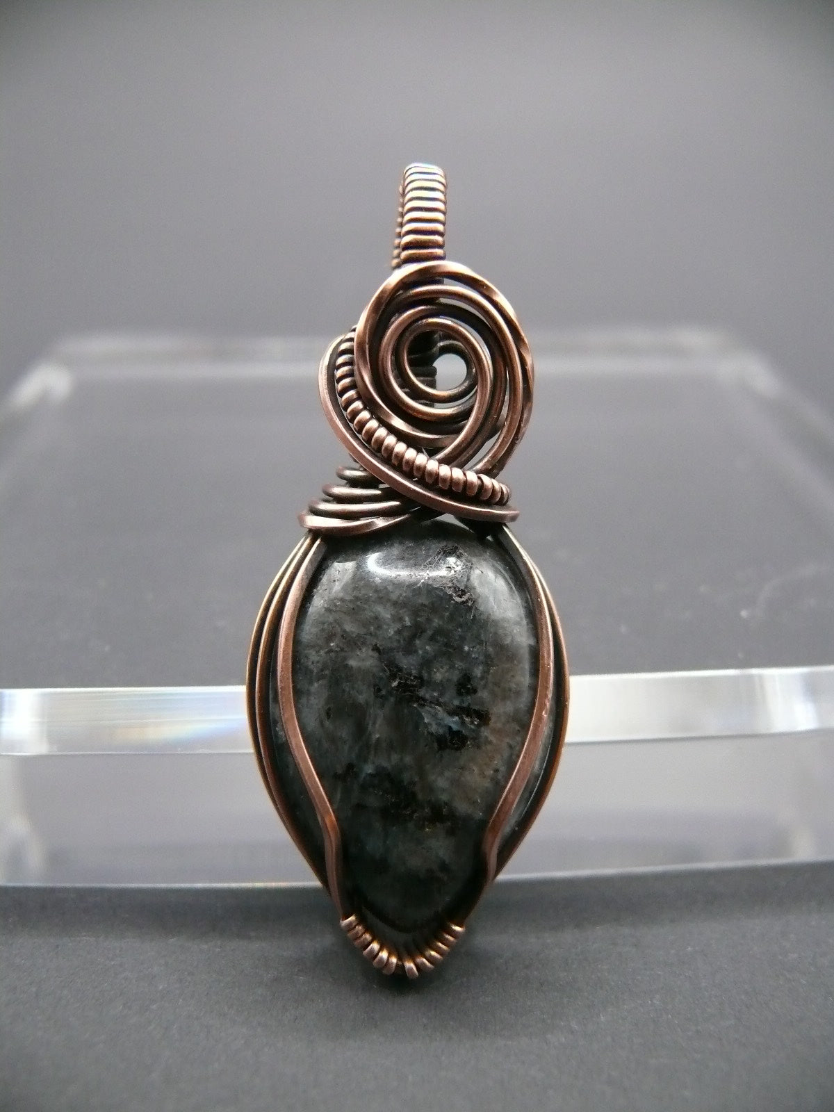 Copper wire wrapped larvikite pendant