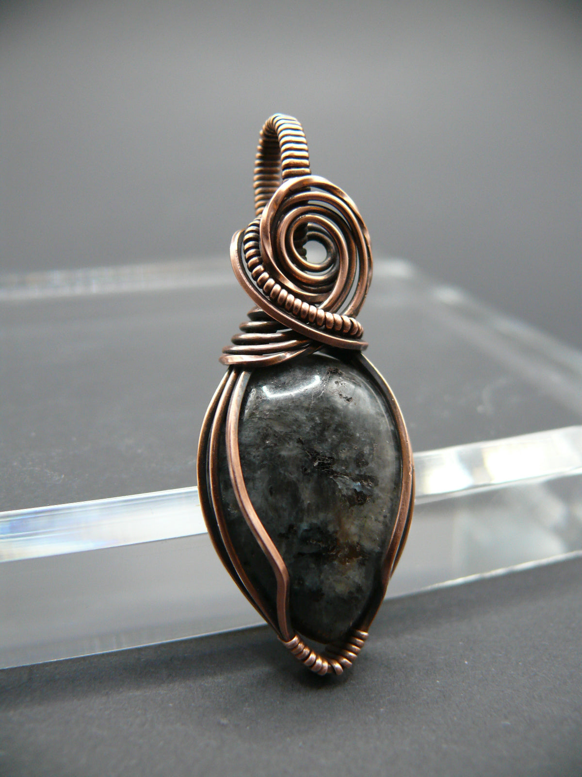 Copper wire wrapped larvikite pendant