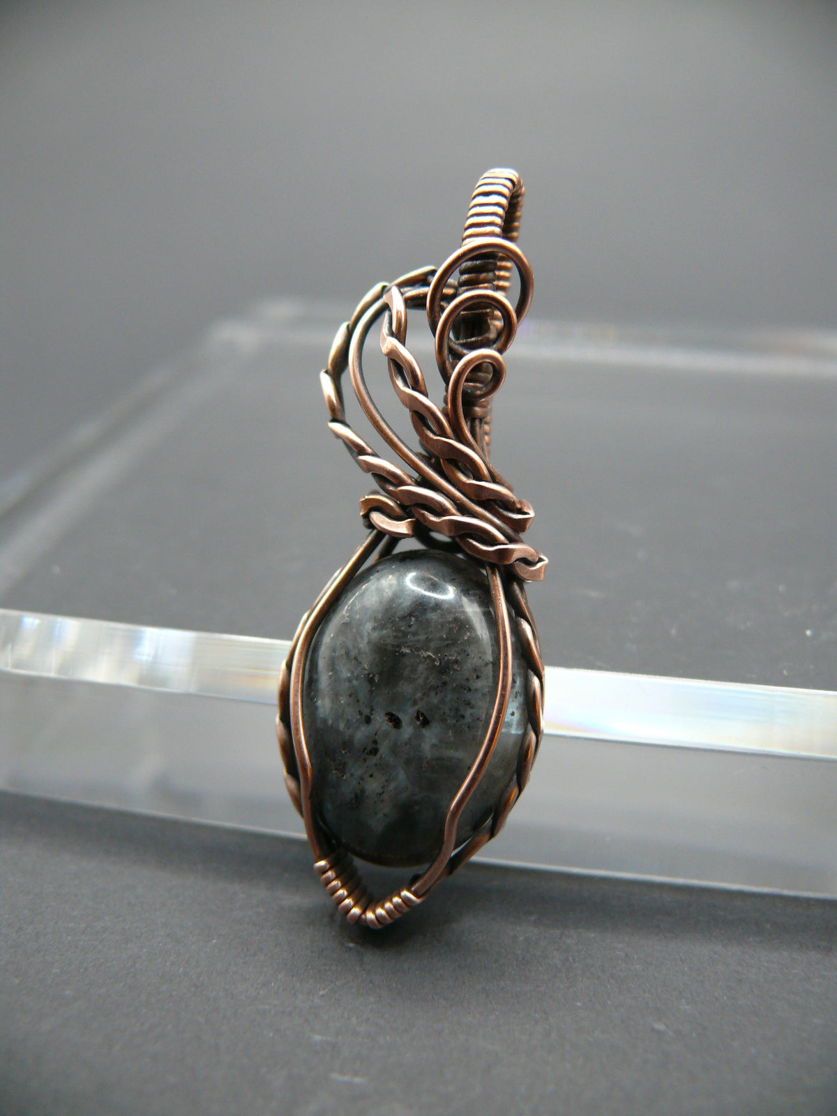 Copper wire-wrapped shimmery larvikite pendant