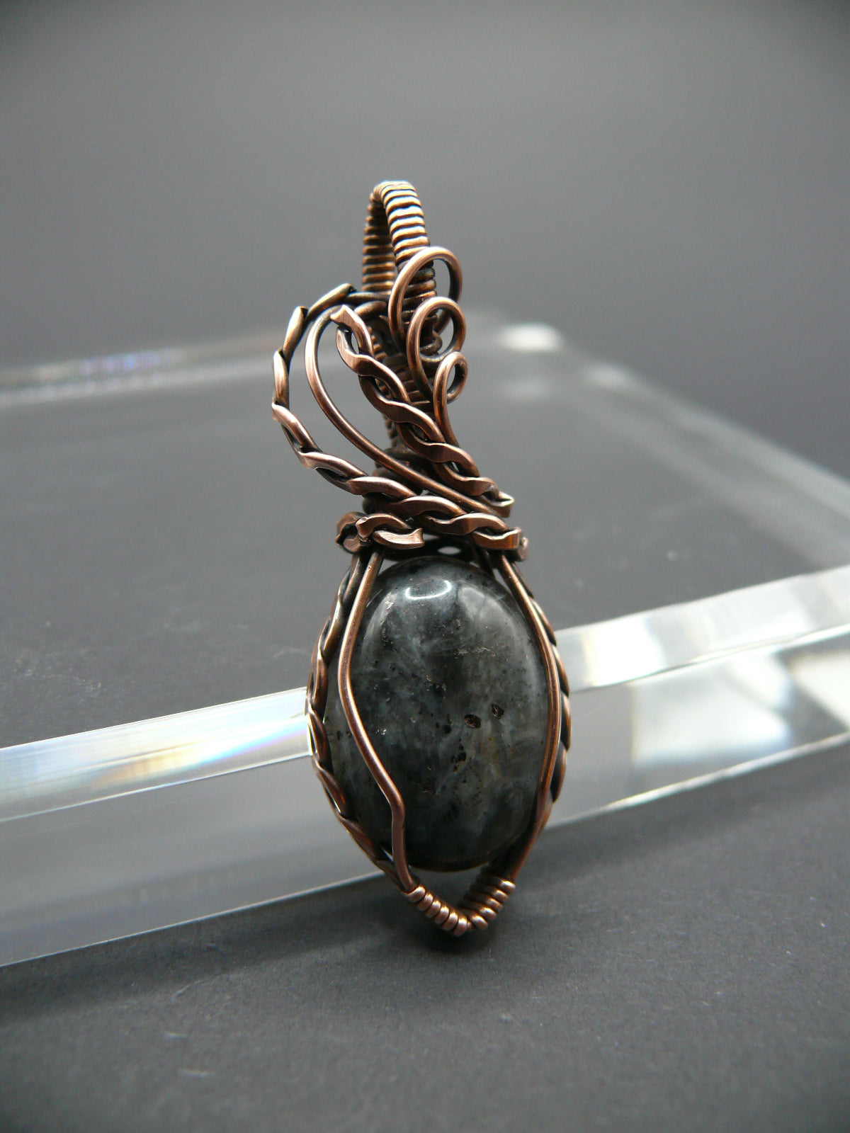 Copper wire-wrapped shimmery larvikite pendant