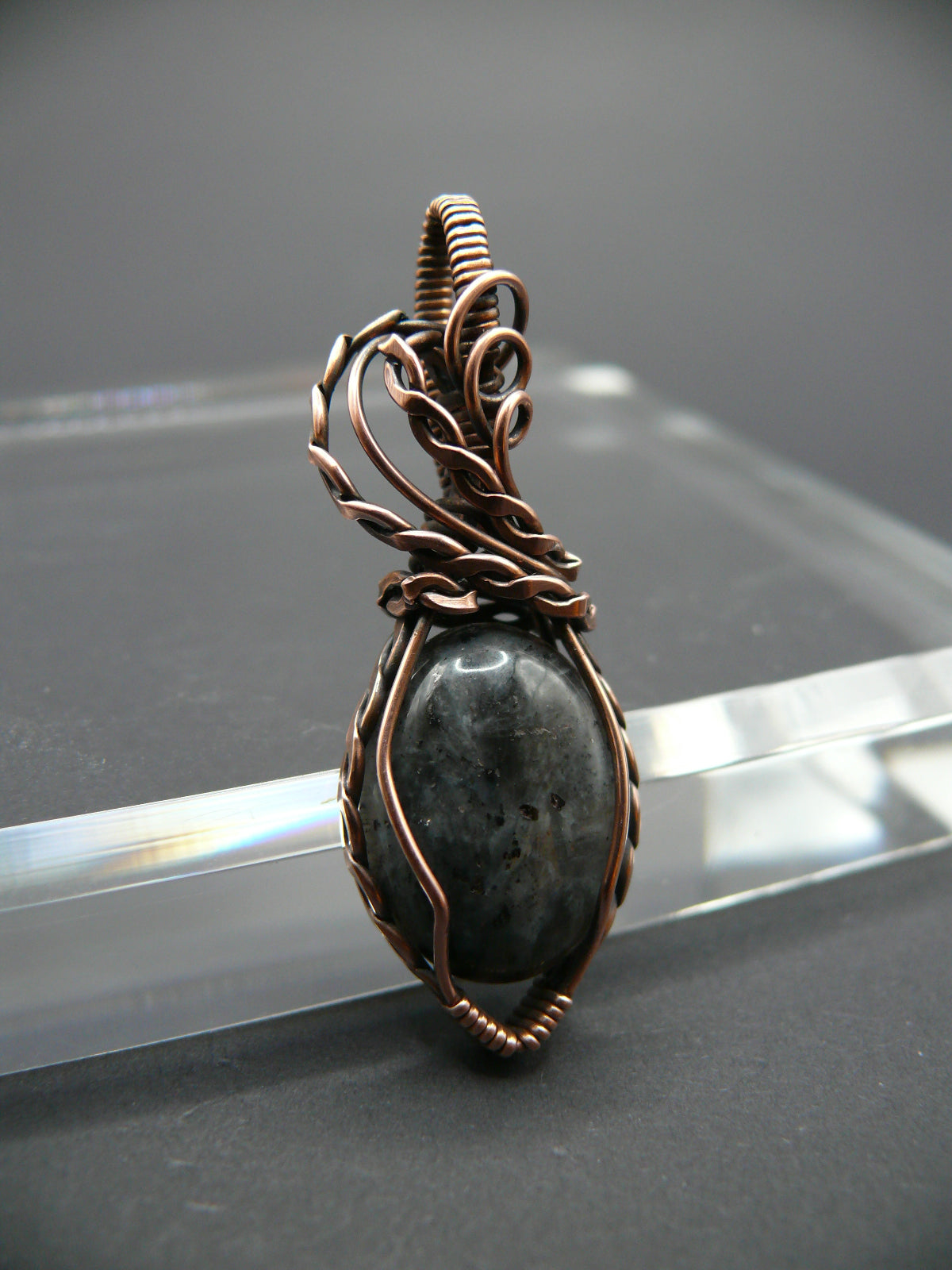 Copper wire-wrapped shimmery larvikite pendant