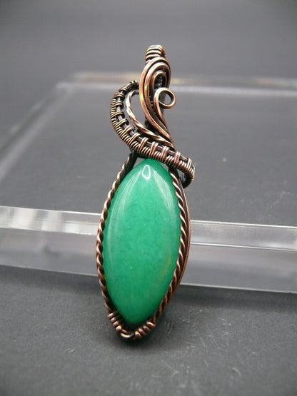 Copper-wrapped Jade gemstone pendant