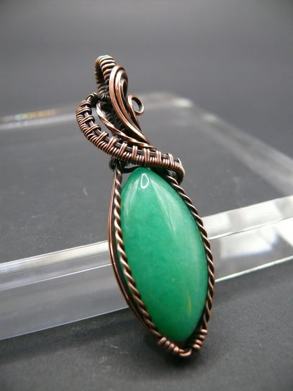 Copper-wrapped Jade gemstone pendant