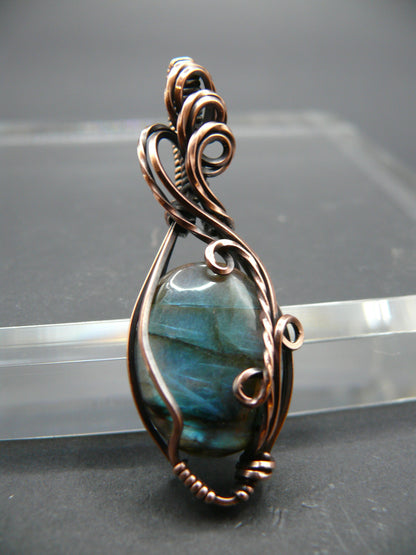 Mini labradorite pendant wrapped in antiqued copper