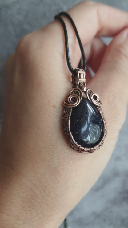 Antiqued wire wrapped blue sandstone pendant