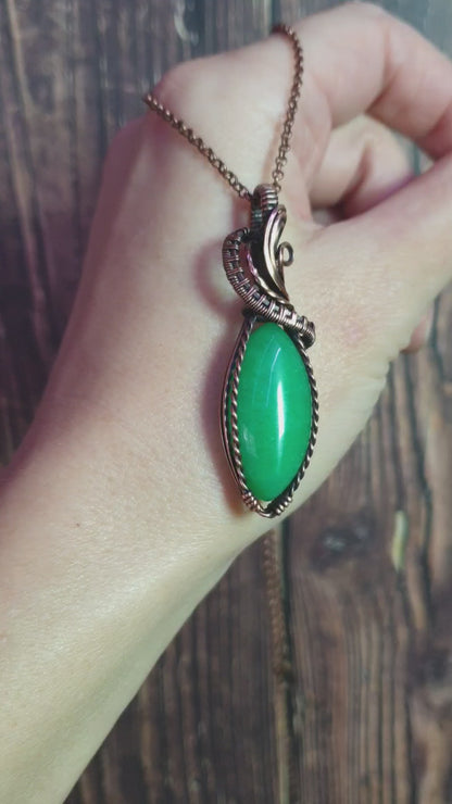 Copper-wrapped Jade gemstone pendant