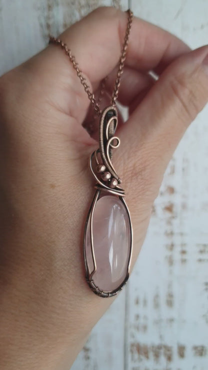 Handmade copper wire wrapped rose quartz pendant