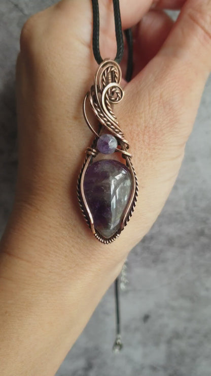 Wire wrapped amethyst gemstone pendant