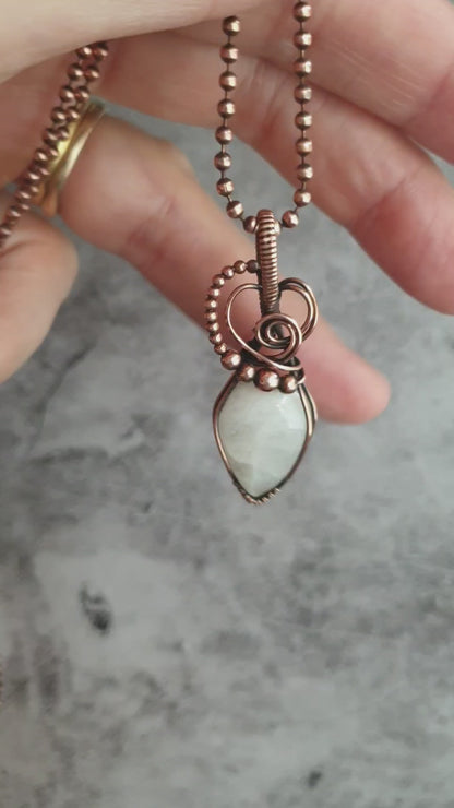 White moonstone gemstone pendant in antiqued copper