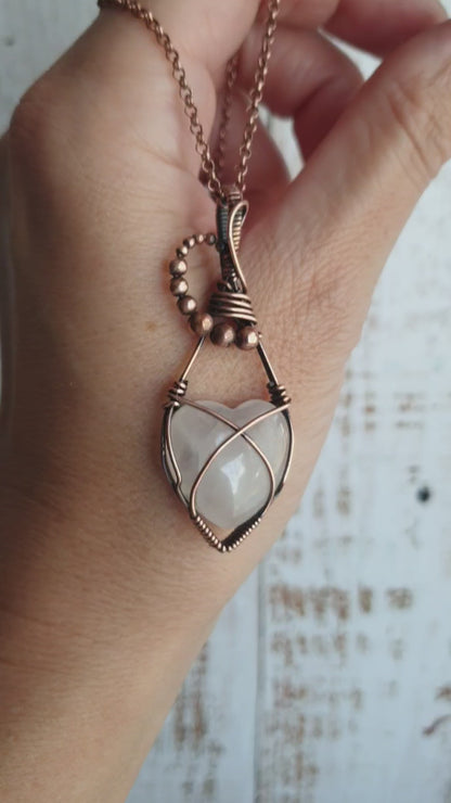 Copper wire-wrapped heart shaped pink rose quartz pendant