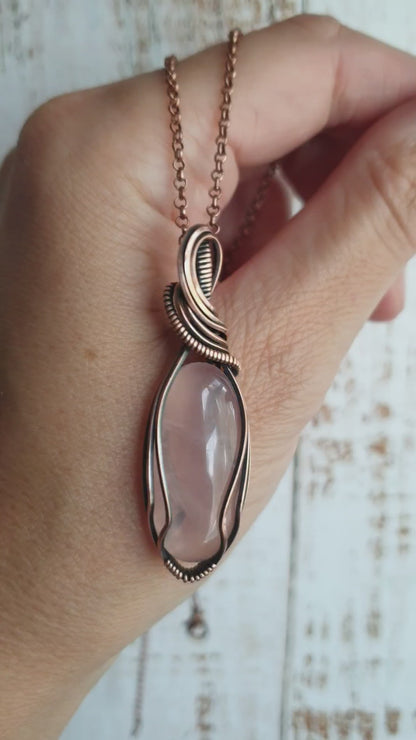 Copper wire wrapped rose quartz pendant