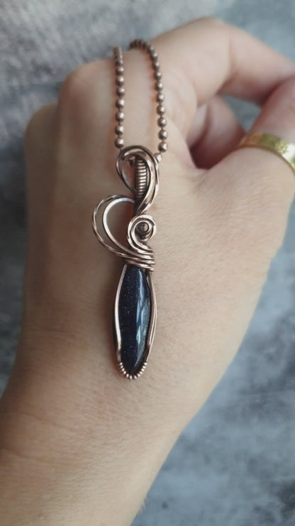 Wire wrapped blue sandstone pendant