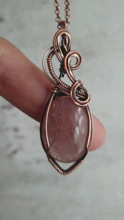 Wire wrapped strawberry quartz pendant