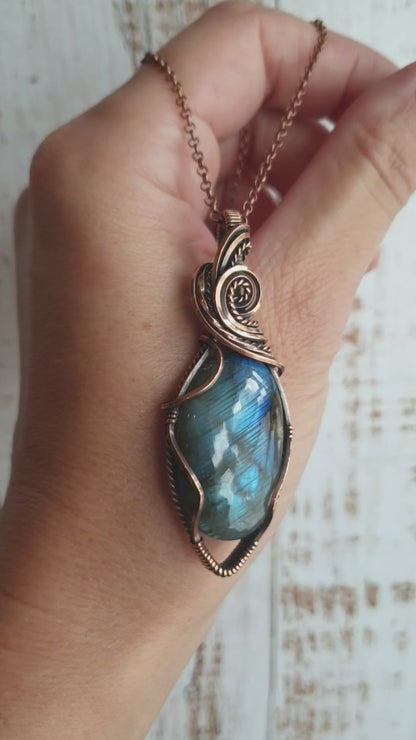 Labradorite pendant in artisan copper wrapping