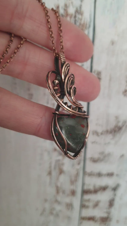 Heart shaped wire wrapped bloodstone gemstone pendant