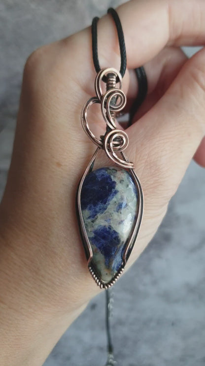 Wire wrapped blue sodalite pendant