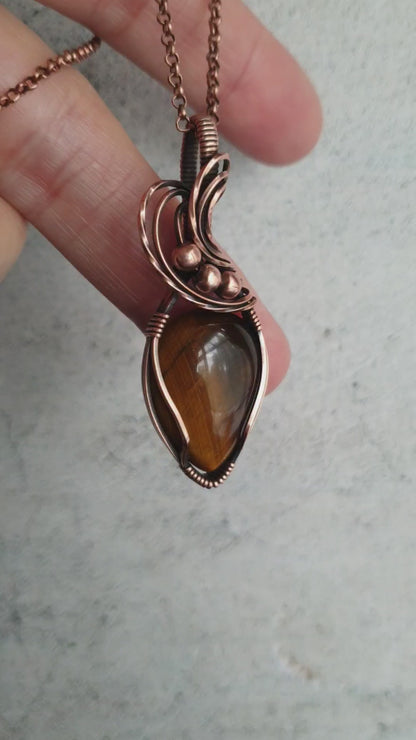 Artisan crafted tiger eye pendant wrapper in copper wire